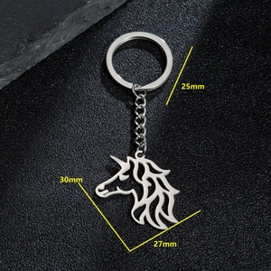 Stainless steel unicorn keychain with a minimalist hollow design and measurement details