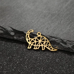 Detailed view of gold plated minimalist geometric hollow dinosaur pendant on stone background