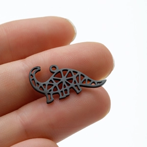 Minimalist black stainless steel dinosaur pendant with geometric hollow design