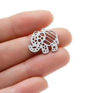Retro stainless steel elephant charm for DIY jewelry making shown on a fingertip