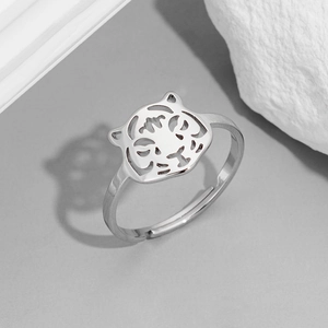 Detail of silver hollow tiger head ring with adjustable band and polished steel finish