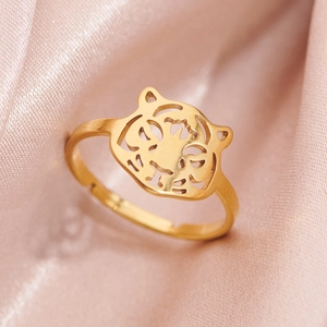 Golden stainless steel adjustable ring featuring a hollow tiger head design for women