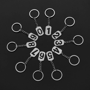 Set of 10 stainless steel rectangle keychains featuring hollowed numbers 0 to 9