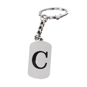 Minimalist silver stainless steel keychain featuring a black uppercase letter C pendant