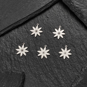 Five pieces set of stainless steel starburst charms for DIY jewelry making and necklace crafts