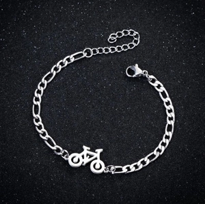 Minimalist stainless steel Figaro chain bracelet featuring a unique bicycle pendant design
