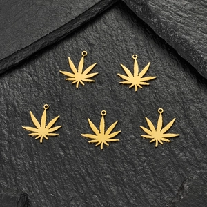 Set of 5 golden cannabis leaf charms on black slate for DIY jewelry making