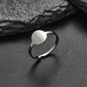 Polished silver stainless steel adjustable open ring with a minimalist flat round disk