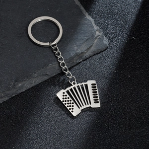Minimalist silver stainless steel accordion musical instrument keychain with a metallic finish
