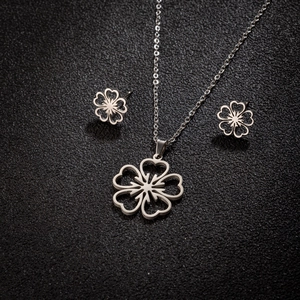 Silver stainless steel hollow flower jewelry set with pendant necklace and matching studs