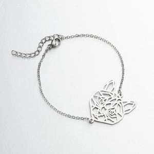 Macro shot of silver hollow cat pendant on stainless steel chain with lobster clasp