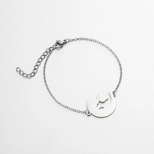 Silver chain bracelet featuring a cat on the moon pendant with adjustable lobster clasp