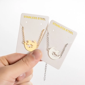 Minimalist stainless steel moon and cat pendant necklace set in gold and silver finish