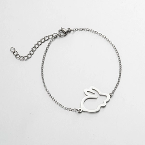 Minimalist stainless steel bracelet featuring a cute hollow bunny charm with lobster clasp