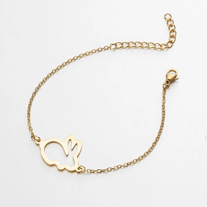 Detail of gold-plated stainless steel chain bracelet with hollow rabbit charm and clasp