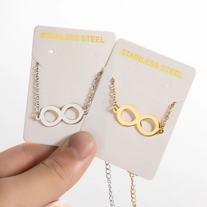 Collier symbole infini en or et argent en acier inoxydable avec chaînes délicates
