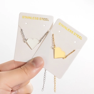 Polished stainless steel heart pendant necklaces in gold and silver for Mother's Day