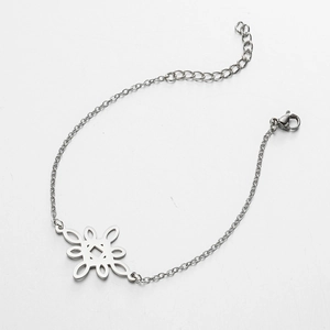Stainless steel chain bracelet featuring a geometric hollow floral knot pendant