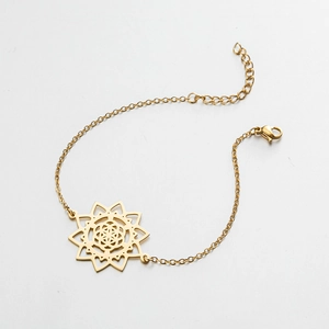 Detailed shot of golden mandala flower pendant with lobster clasp and adjustable chain