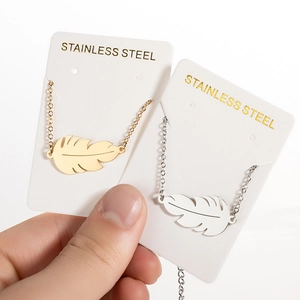 Minimalist stainless steel leaf pendant bracelet set in gold and silver finish