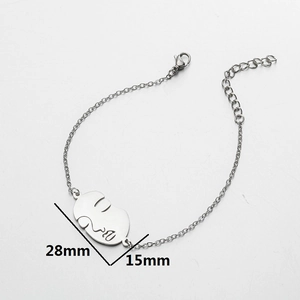 Bracelet chaîne minimaliste avec pendentif visage abstrait et fermoir réglable en métal