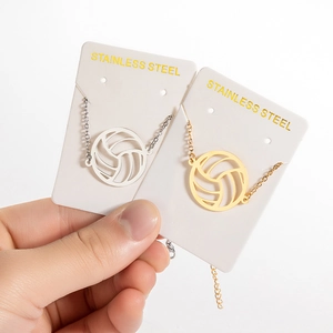 Colliers avec pendentif volleyball évidé en acier inoxydable fini doré et argenté