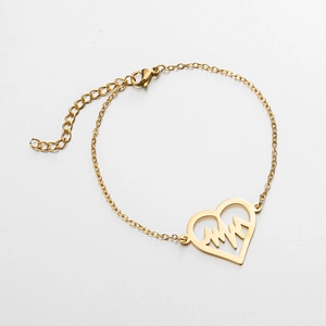 Detail of adjustable gold heart bracelet with EKG heartbeat design and lobster clasp
