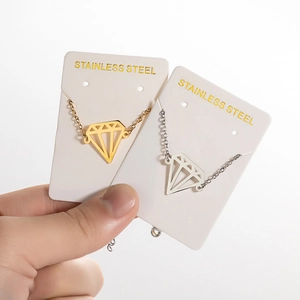 Hollow geometric diamond pendant bracelet in gold and silver stainless steel