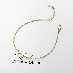 Gold minimalist airplane charm bracelet made of stainless steel for travel enthusiasts