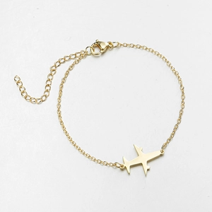 Detail of gold plane charm bracelet with adjustable chain and lobster clasp closure