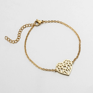 Detailed view of adjustable 18K gold plated stainless steel heart charm bracelet