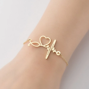 Bracelet stéthoscope doré avec battement de coeur et breloque coeur pour femmes