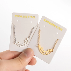 Adjustable stainless steel necklaces with moon and star pendants in silver and gold finish
