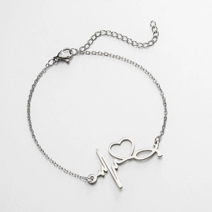 Bracelet poli en acier inoxydable avec cœur creux et motif ECG de stéthoscope pour femmes