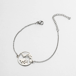 Detailed macro view of the silver stainless steel world map pendant with lobster clasp