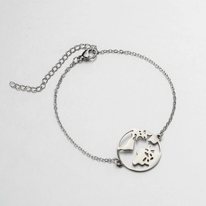 Minimalist silver chain bracelet featuring a hollow world map globe circular pendant