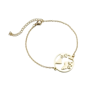 Golden chain bracelet with a cutout world map charm on a clean white background