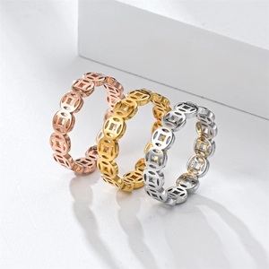 Three vintage hollow-out ancient coin rings in gold, rose gold and silver stainless steel