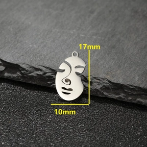 Minimalist silver face pendant with 17mm x 10mm dimensions for jewelry making