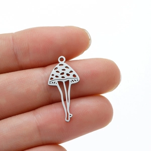 Detailed view of silver mushroom man pendant for DIY jewelry making handmade crafts