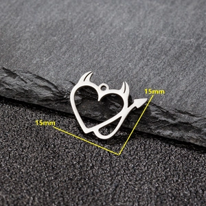 Mini stainless steel silver devil heart pendant with horns and tail measuring 15mm