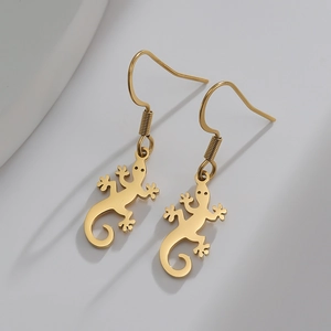 Polished 18K gold stainless steel gecko lizard dangle earrings on light background