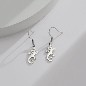 Minimalist lizard earrings in hollowed stainless steel with a sleek silver finish design