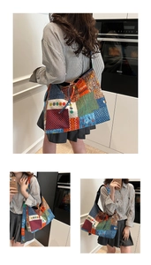 Detail of colorful patchwork bohemian canvas tote bag showing multiple pattern textures