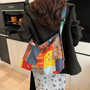 Bohemian patchwork canvas tote bag with colorful ethnic patterns and adjustable strap