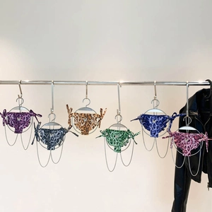 Set mit sechs bunten Bikinihosen mit Leopardenmuster, Schmetterlingsdekor und Seitenschleifen