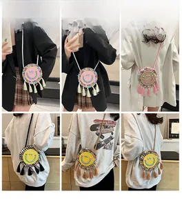 Detailed views of circular woven mini bag with beaded smiley face and fringe tassels