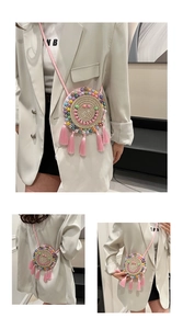 Detail of hand-woven round bag with colorful bead smile pattern and pink silk tassels