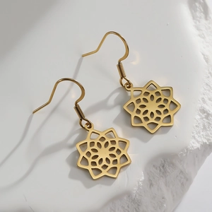 Golden stainless steel mandala flower earrings with intricate hollow cutouts for women