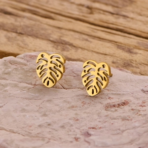 Golden monstera leaf stud earrings in polished stainless steel for women